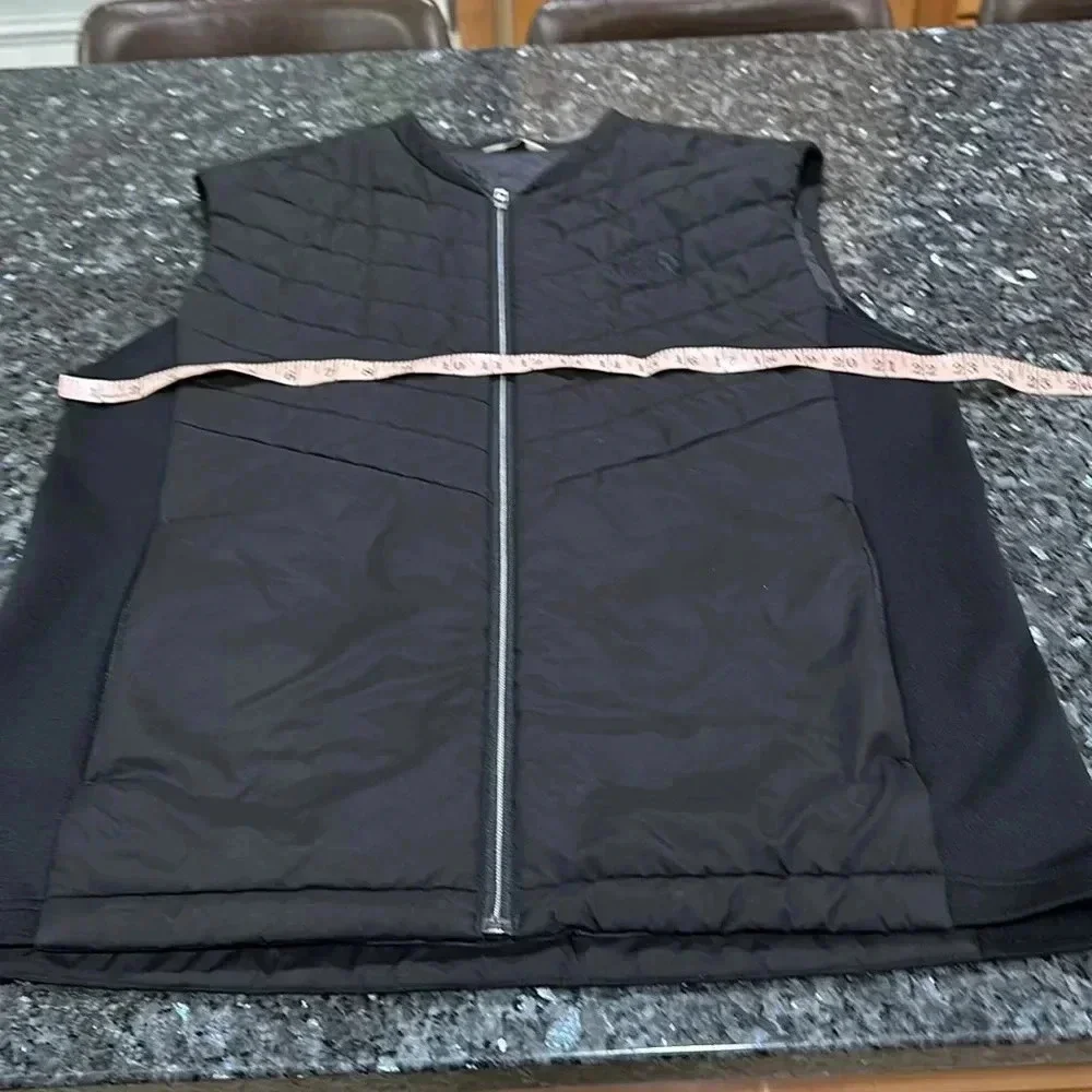 The North Face black puffer vest full front zip, pockets, front and back logo